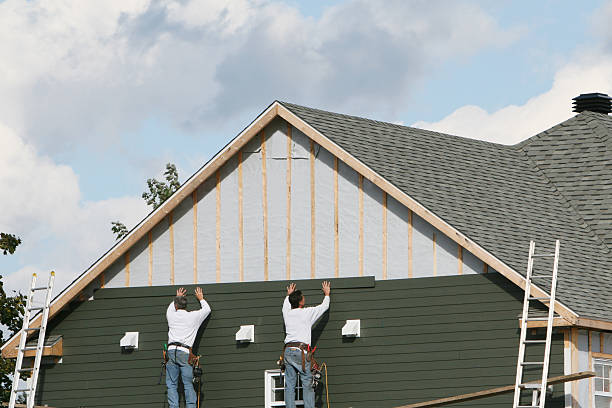 Professional Emergency Siding Repair technician working in Woodstock, OH